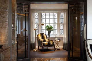 casa forma luxury interior design gold and black armchair & floor lamp in kensington gardens london